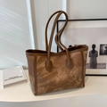 Bolso tote marrón con textura jaspeada y bordes reforzados de cuero marrón oscuro - Marrón
