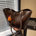 Retro dark brown leather tote bag with a creative crochet orange charm accessory - Coffee without Pendant