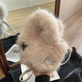 Beige faux fur bucket bag with star patches and slim white shoulder strap for women - Beige