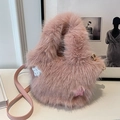 Fuzzy pink plush bucket bag with star detail and adjustable crossbody strap - Deep Pink