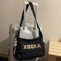 Black canvas tote bag with XBOKA embroidery and checkered pendant for daily use - Black With Pendant