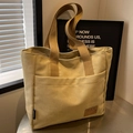 Große khakifarbene Canvas-Einkaufstasche mit Vordertasche und Schultergurten im Alltagsstil - Khaki