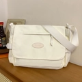 Bolso mensajero de lona blanca con correa ancha ajustable y detalle de logotipo oval - Blanco Sin Colgante