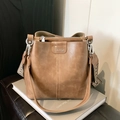 Brown retro leather bucket bag with adjustable patterned wide strap and silver hardware - Khaki (Silver Logo)