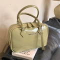 Elegant sage green patent leather handbag with dual handles and silver monmon metal logo - Light Green