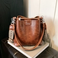 Vintage brown leather bucket bag with jacquard woven wide strap and silver hardware - Brown (Silver Logo)