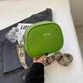 Grass green leather crossbody bag with jacquard wide strap and BYELM logo lettering - Green