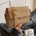Structured beige leather crossbody bag with accordion folds and matte gold hardware - Khaki