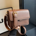 Deep brown matte leather crossbody bag with vintage gold buckle and multi-layered design - Brown
