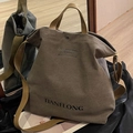 Brown canvas tote bag with adjustable strap and bold letter printing for women - Gray