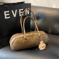 Ginger yellow leather bowling bag with twin handles and cute brown fur ball charm - Khaki With Pendant