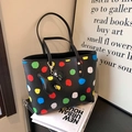Fashionable black tote bag with colorful polka dots and cute dog charm for daily use - Black