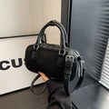 Mini black pebbled leather Boston bag with double handles and adjustable strap - Black