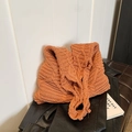 Large orange knitted tote bag featuring a thick striped texture for autumn winter fashion - Brown