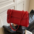Minimalist red faux leather shoulder bag with glossy finish and long thin straps - Burgundy