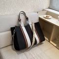 Black canvas tote bag with striped straps and patterned crossbody belt for daily use - L Black