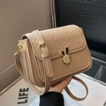 Bolso bandolera beige con relieve de dibujos y cierre giratorio de orejas de conejo - Caqui
