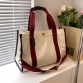 Beige canvas tote bag with brown leather trim and red striped handles in variant view - Large / White