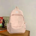 Minimalist light pink backpack for women with front zipper pocket and drawstring side pouches - Pink Without Pendant