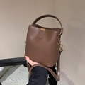 Dark brown matte leather bucket bag with top handle and gold-tone hardware detail - Universal Specification / Light Coffee