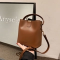Minimalist dark brown leather bucket bag with top handle and adjustable strap - Universal Specification / Brown