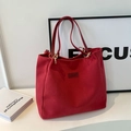 Minimalist red canvas tote bag with brown leather handles and golden metal hardware details - Red (No Pendant)