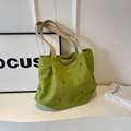 Grass green canvas tote bag with colorful embroidery and cream-white handles - Green