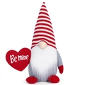 Detail view of gnome plush with striped hat holding a red Be Mine heart decoration - Striped Style (Be mine)