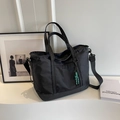 Large black nylon travel tote with detachable shoulder strap and stripe pendant - Black With Pendant