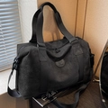 Large capacity black matte travel bag with dual handles and detachable shoulder strap - Black