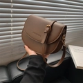 Deep brown matte leather saddle bag with adjustable strap and gold metal hardware - Coffee