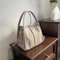 Colorful striped woven tote bag in beige with lavender faux leather handles and strap - Purple