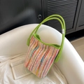 Colorful striped woven bucket bag with vibrant green leather handles and silver hardware - Green