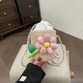 Mini beige straw bucket bag with large pink floral decoration and rope strap - Pink