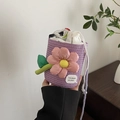 Mini purple woven bucket bag with large 3D pink flower decoration and white inner pouch - Purple