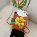 Mini orange woven bucket bag with 3D yellow flower and drawstring inner pouch - Orange