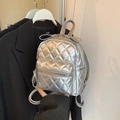 Mini silver quilted backpack with metallic finish and adjustable straps for women - Silver