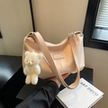 Minimalist pale pink shoulder tote bag with plush bear pendant and fashion embossing - Pearlescent Pink