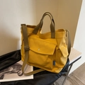 Minimalist ginger yellow canvas tote bag with adjustable strap and front snap pocket - Yellow