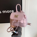 Pink mini faux leather backpack with silver butterfly buckle and colorful bead charms - Purple