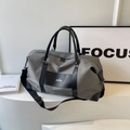 Large dark grey waterproof nylon travel bag with black leather trim and MOCO logo - Gray