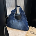 Navy blue denim hobo bag with contrast stitching and crescent silhouette design - Dark Blue