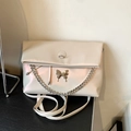 Iridescent white tote bag with metallic butterfly detail and chunky silver chain - Pearlescent Pink