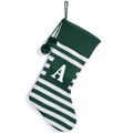 Green and white striped knitted Christmas stocking with a white letter A and pom poms - Green and White Striped Letter A