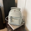 Fashionable light green faux leather backpack for women with woven texture front pocket - Green