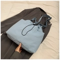 Detail of light blue waterproof nylon tote with adjustable black drawstring closure - No Pendant / Blue