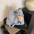 Light blue drawstring tote bag with plush coffee cup charm and large front pocket - With Pendant / Blue