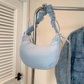 Light blue quilted cloud underarm bag with ruffled strap and bow details - Blue