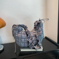 Chic grey quilted dumpling handbag with ruffle trim and soft padded nylon texture - Gray
