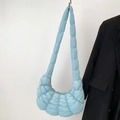 Light blue pleated dumpling crossbody bag with soft padded cloud texture and shoulder strap - Blue Small